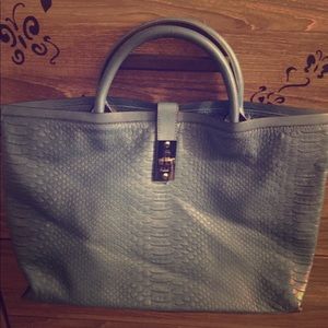 Christian Lacroix Blue alligator handbag.